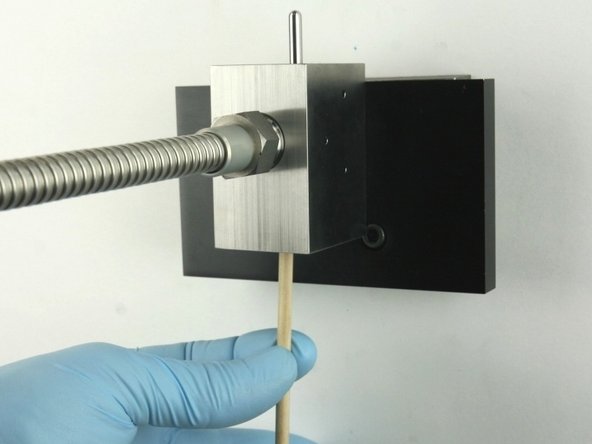 Remove all the valve components from the valve body with the included dowel.