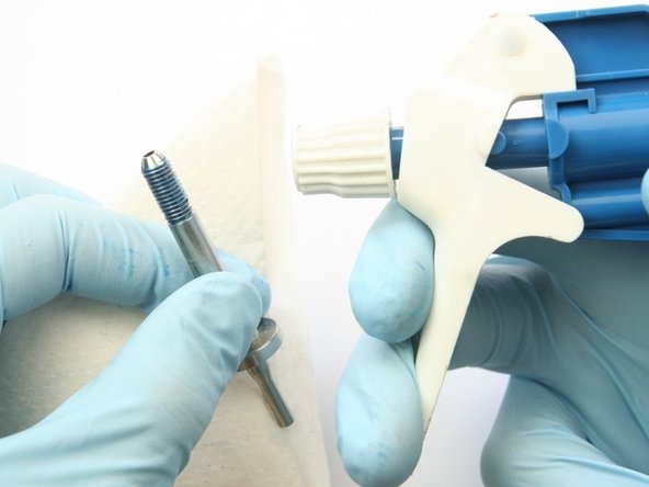 Clean the swivel shaft of all lithium grease and Blue Goop with isopropyl alcohol or a similar cleaning agent.