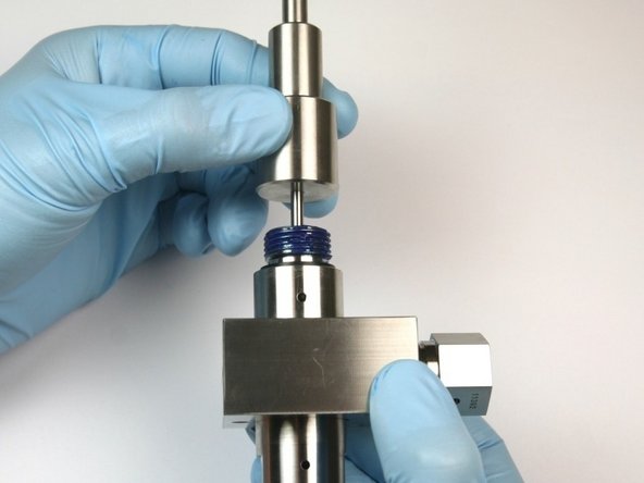 With the bleed down valve tool push through the bleed-down valve body to remove all components.