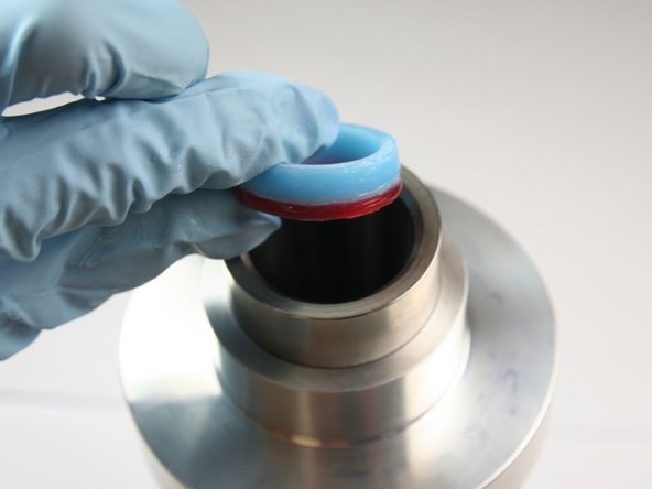 Put the high-pressure seal assembly into the sleeve with the o-ring first.