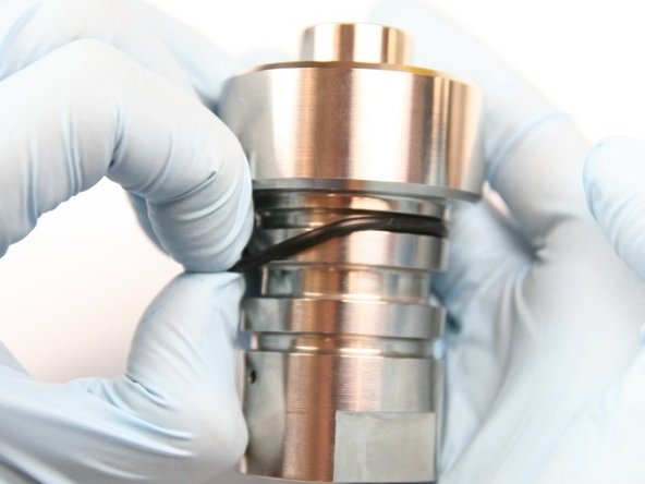 Remove the inner O-ring from the check valve body.