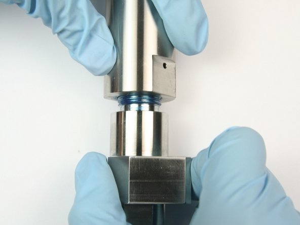 Unthread the actuator housing from the valve body.