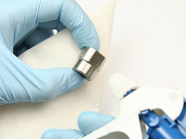 Clean the swivel nut of all Blue Goop with isopropyl alcohol or a similar cleaning agent.