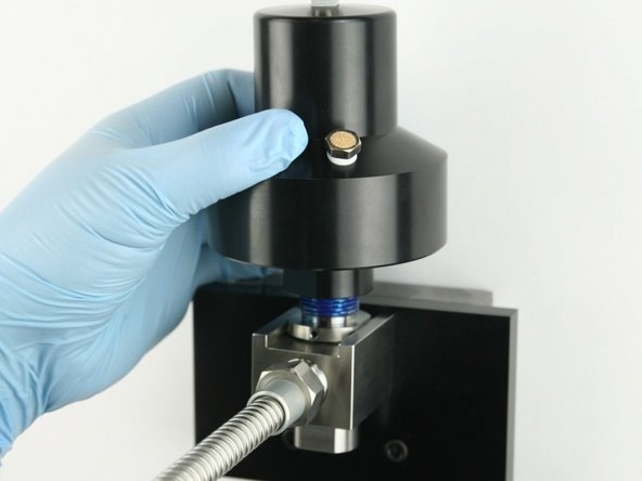 Thread (hand tighten) the actuator to the top of the valve body.