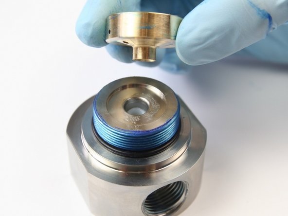 Remove the bearing back-up from the seal half of the swivel housing.