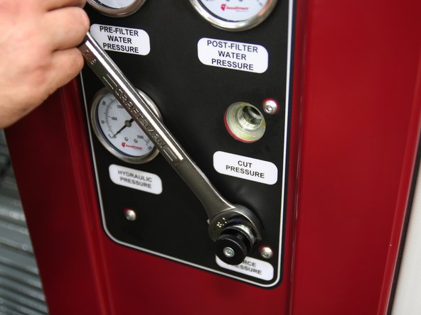 Install control knobs &quot;Cut&quot; and &quot;Pierce&quot; into respective ports on front of manifold.