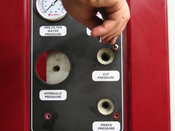 Install new manifold onto pump frame.