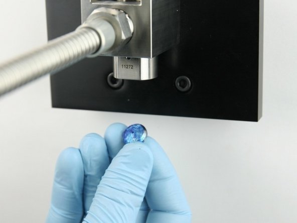 Put the poppet seat at the bottom of the valve body.