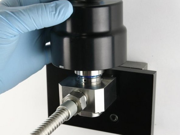 Unthread the actuator from the valve body.