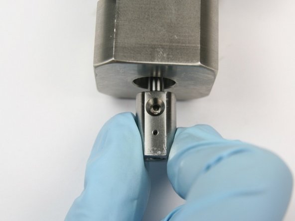 Put the swivel shaft into the collar end of the assembly with the swivel shaft holes alligned with the hole in the collar.