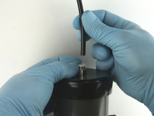 Disconnect the air line from the actuator.