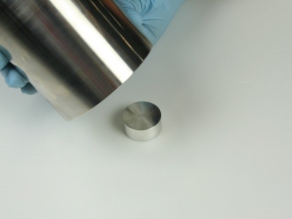 Put the high-pressure cylinder onto the high-pressure seal installation spacer tool.