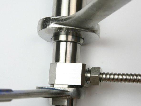 Loosen actuator housing from Valve Body using 1-1/16&quot; and 7/8&quot; wrench