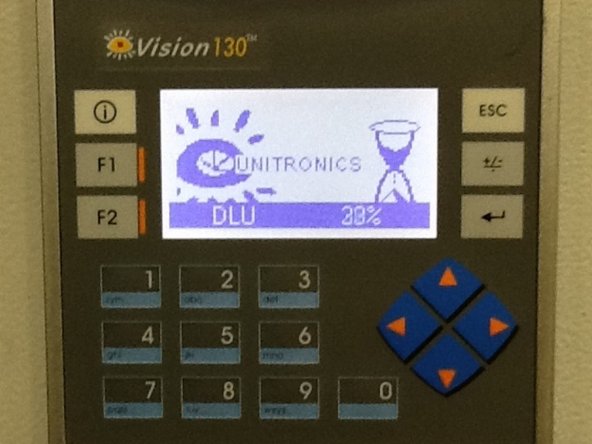 Wait while program is loaded on PLC.