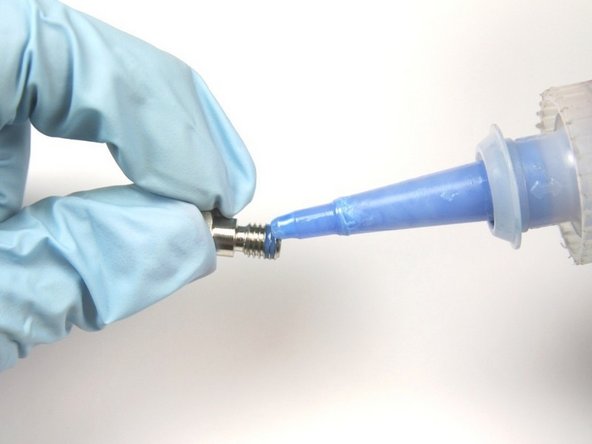 Apply blue loctite 242 to the first two threads of the retaining screw.