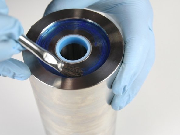 Apply Blue Goop to the outer edge of the high-pressure cylinder inset.