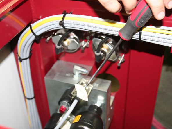 Tighten DIN connectors to coils.