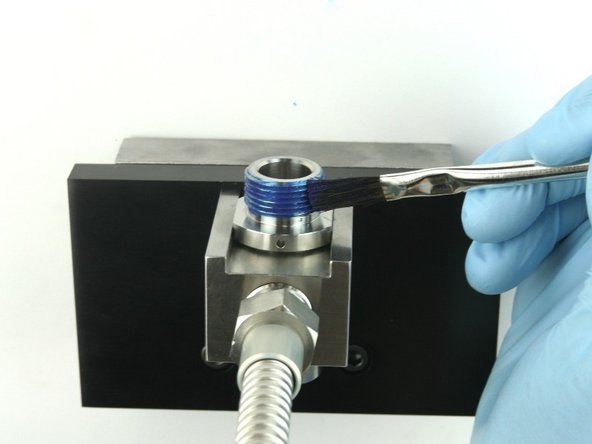 Apply Blue Goop to the  top threads of the valve body.