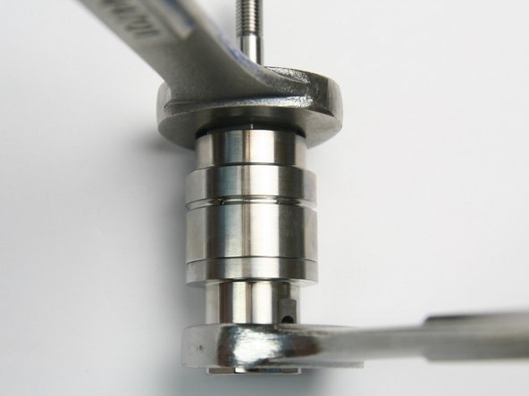 Tighten both seal half and bearing half of swivel housing using two 3/4&quot; wrench.