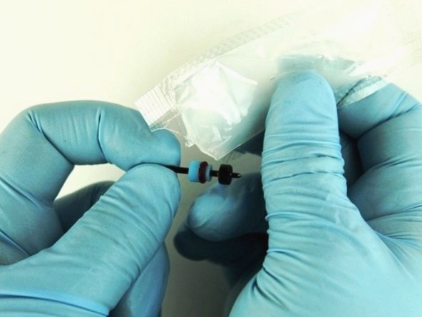 Apply a high-pressure lubricant or similar (11336) to the outside diameter of the high-pressure valve seal.