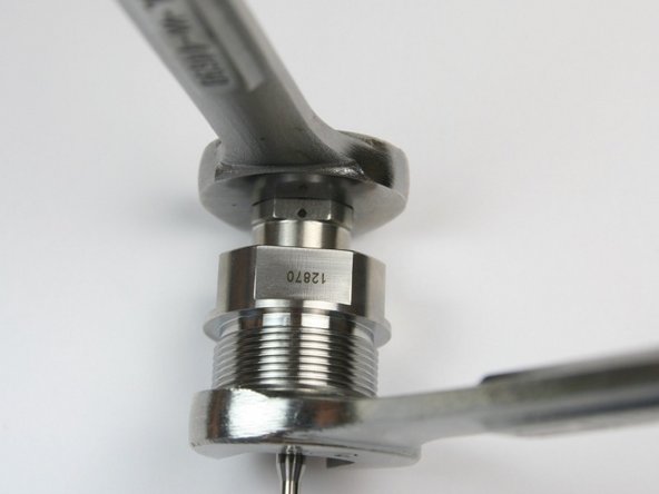 Tighten swivel nut to swivel shaft