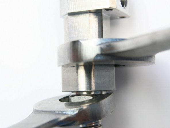 Loosen the 3/8&quot; high-pressure gland from the outlet adapter using 13/16&quot; and 1&quot; wrench.