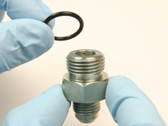 Replace the O-ring around the hydraulic fitting with the O-ring from the kit (the smallest O-ring from the kit).