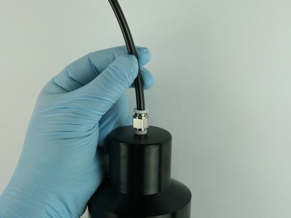 Reconnect the air line to the top of the actuator.