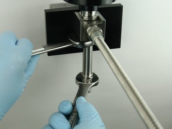 Tighten the nozzle tube to the valve body using 3/4&quot; and 7/8&quot; wrench.