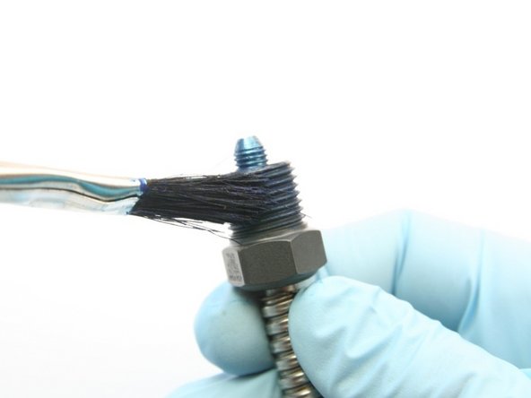 Apply Blue Goop to the high-pressure gland threads.