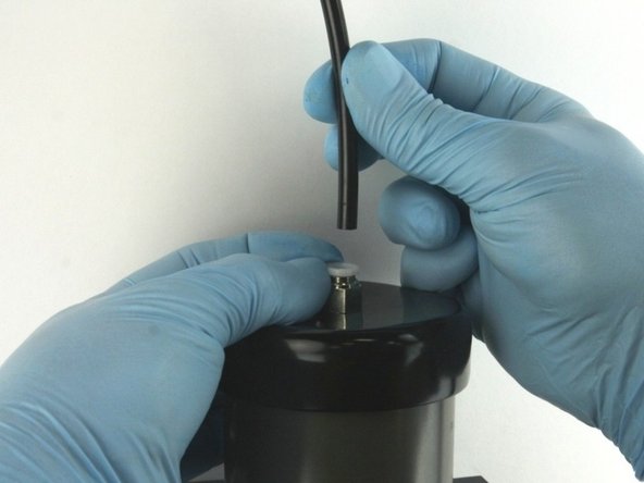 Disconnect the air line from the actuator.