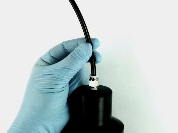 Reconnect the air line to the top of the actuator.