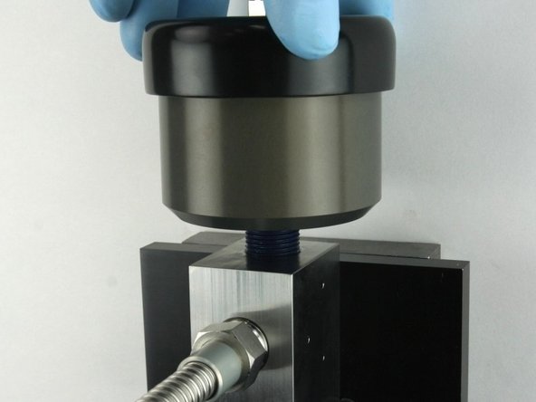 Thread (hand tighten) the actuator into the top of the valve body until it bottoms out.