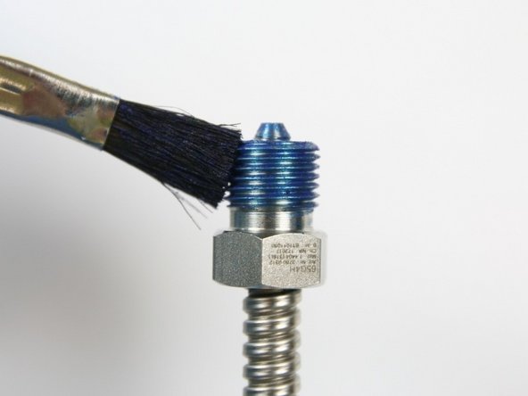 Apply Blue Goop to the gland nut threads.