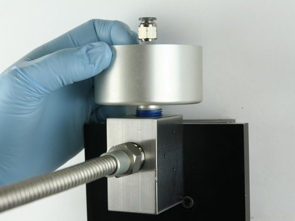 Thread (hand tighten) the actuator into the top of the valve body until it bottoms out.