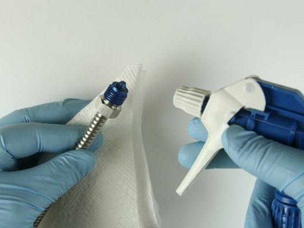 Clean the high-pressure tubing threads and cone of all Blue Goop with isopropyl alcohol or a similar cleaning agent.