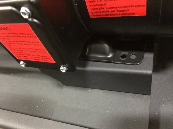 Align the slots (4) on the boost motor with the holes on the mounting bracket.