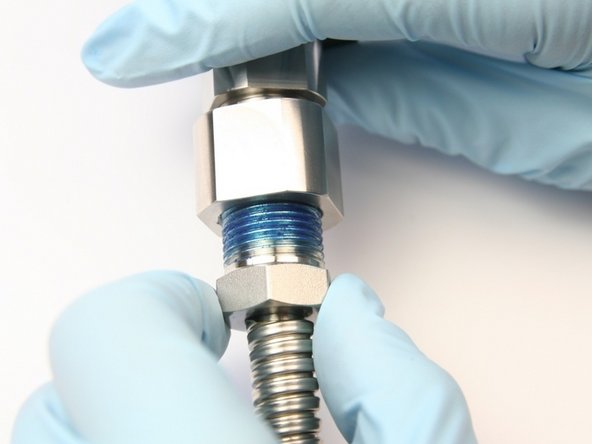 Thread in gland nut with HP tubing into bleed down valve adapter