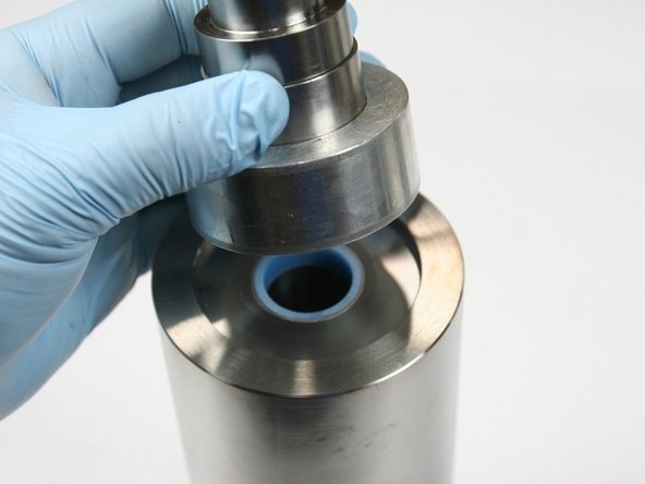 Hold down sleeve while seating hoop to ensure hoop doesn't catch on edge of HP cylinder