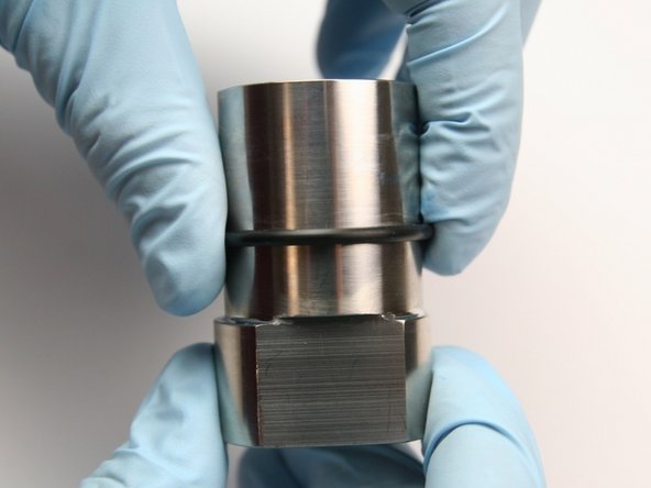 Place the O-ring onto the seal half of the swivel housing in the groove.