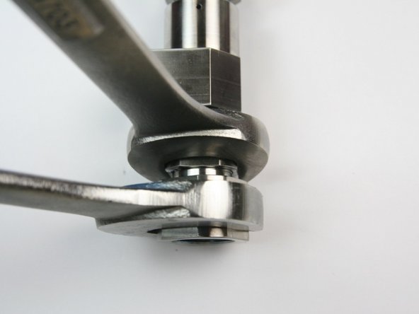 Using a 1&quot; wrench on the outlet adapter and a 7/8&quot; wrench on the valve body, tighten together securely.