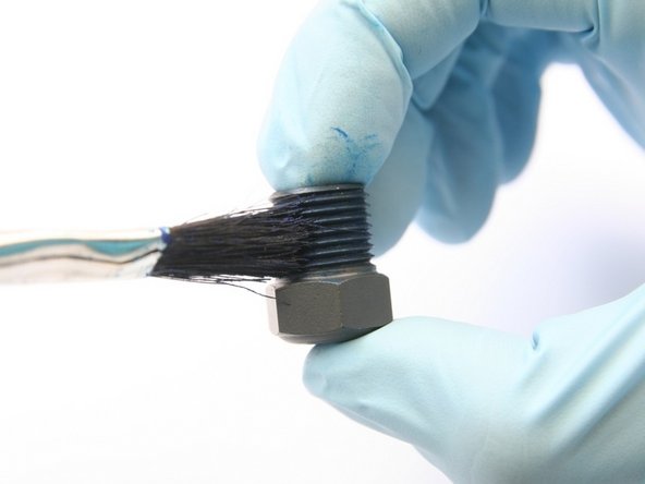 Apply Blue Goop to the high-pressure gland nut threads.