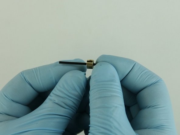 Put the bushing stem onto the poppet stem.