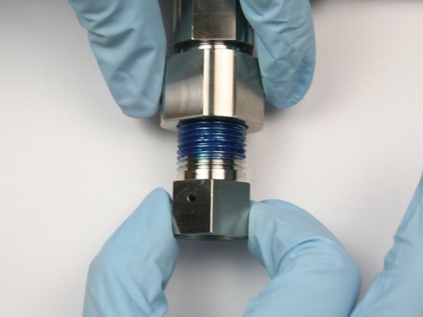 Thread in bleed down valve adapter to bleed down valve outlet