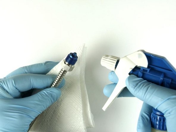 Clean high-pressure gland of all Blue Goop with isopropyl alcohol