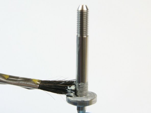 Apply lithium grease to the shelf of the new swivel shaft from the kit.