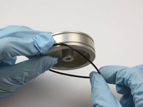 Put one O-ring from the kit onto the groove of the piston.