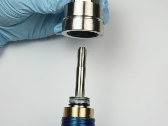 Put the seal half into the bearing half of the swivel housing.