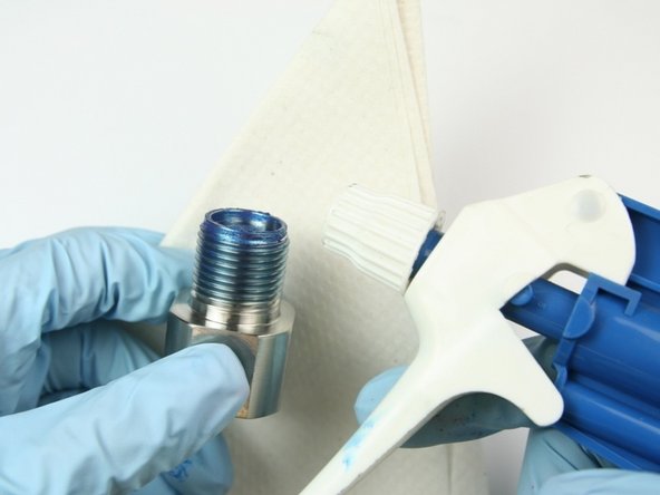 Clean outlet adapter of all blue goop with isopropyl alcohol