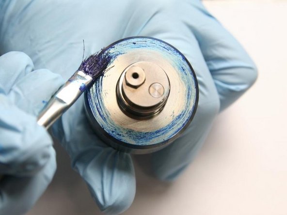 Apply a light coat of Blue Goop around the outer face of the check valve body.